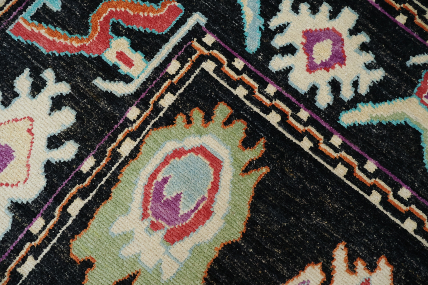 Bright and Whimsical Black Oushak Turkish Rug with Abstract Elements 8x11