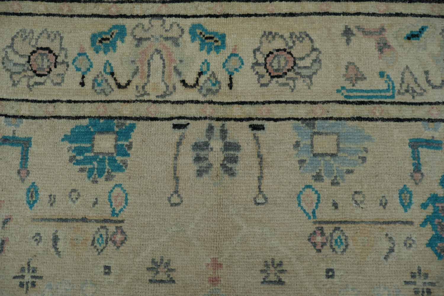 Oushak Turkish Rug with a cream/beige background and blue/turquoise accents 5x6