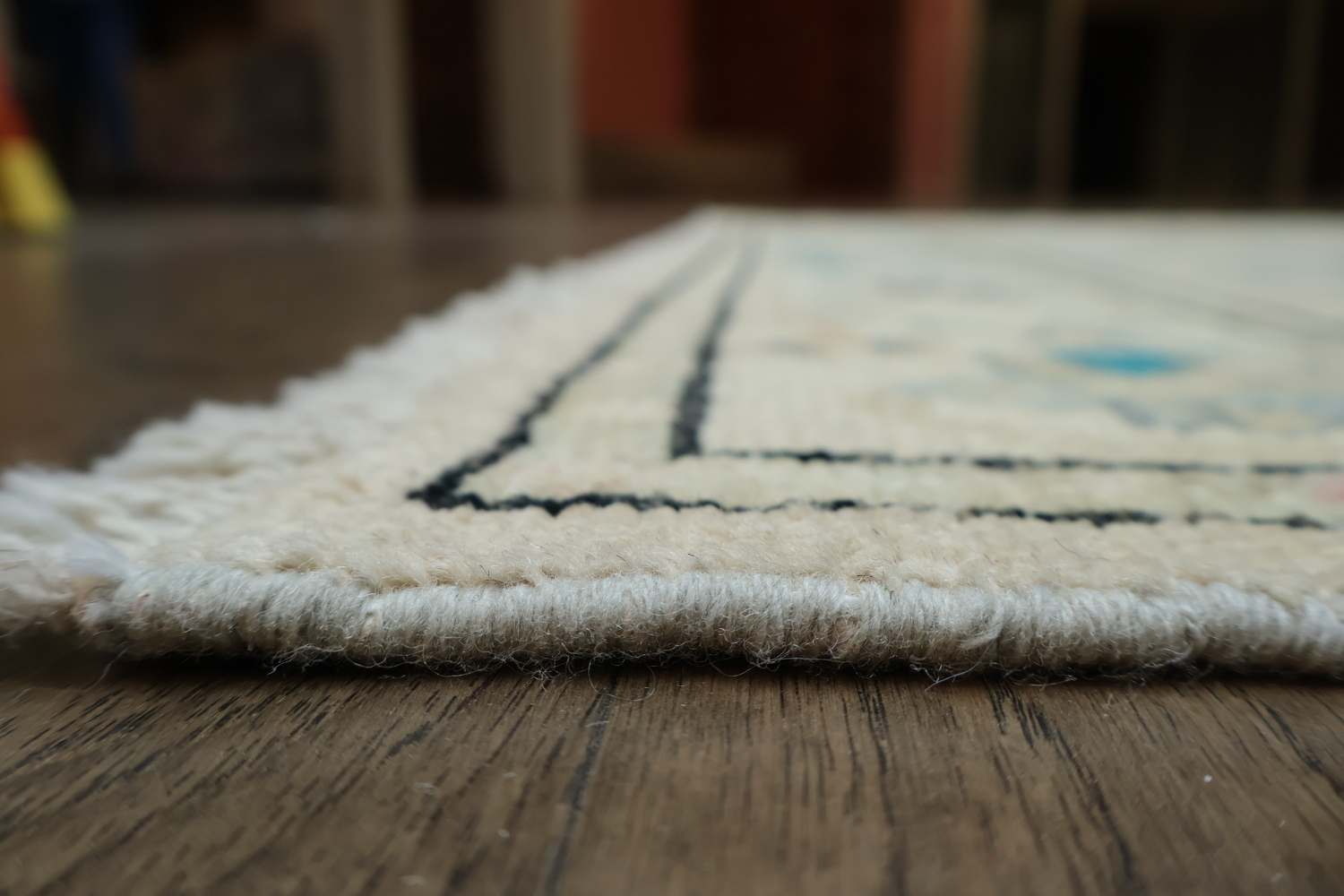 Oushak Turkish Rug with a cream/beige background and blue/turquoise accents 5x6