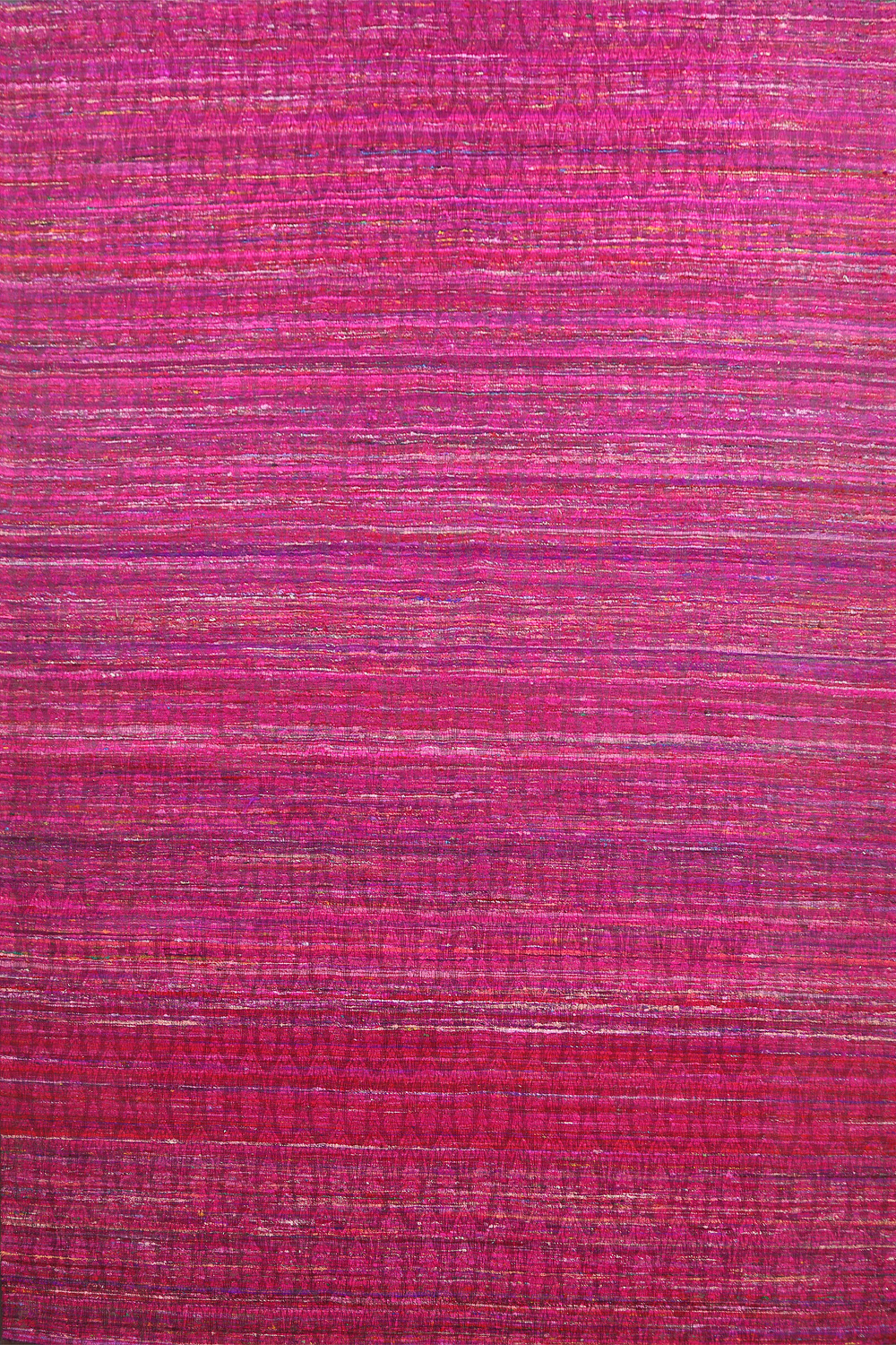 Handwoven Raspberry Rug Adds a Pop of Color