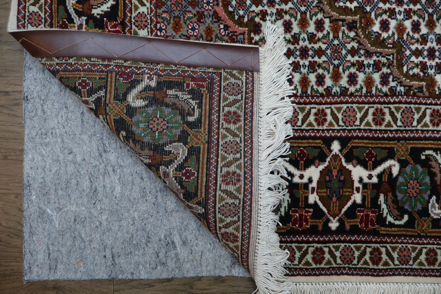 Wool and Silk Persian Tabriz Mahi design Area rug with an ivory field and Black Border 5x7