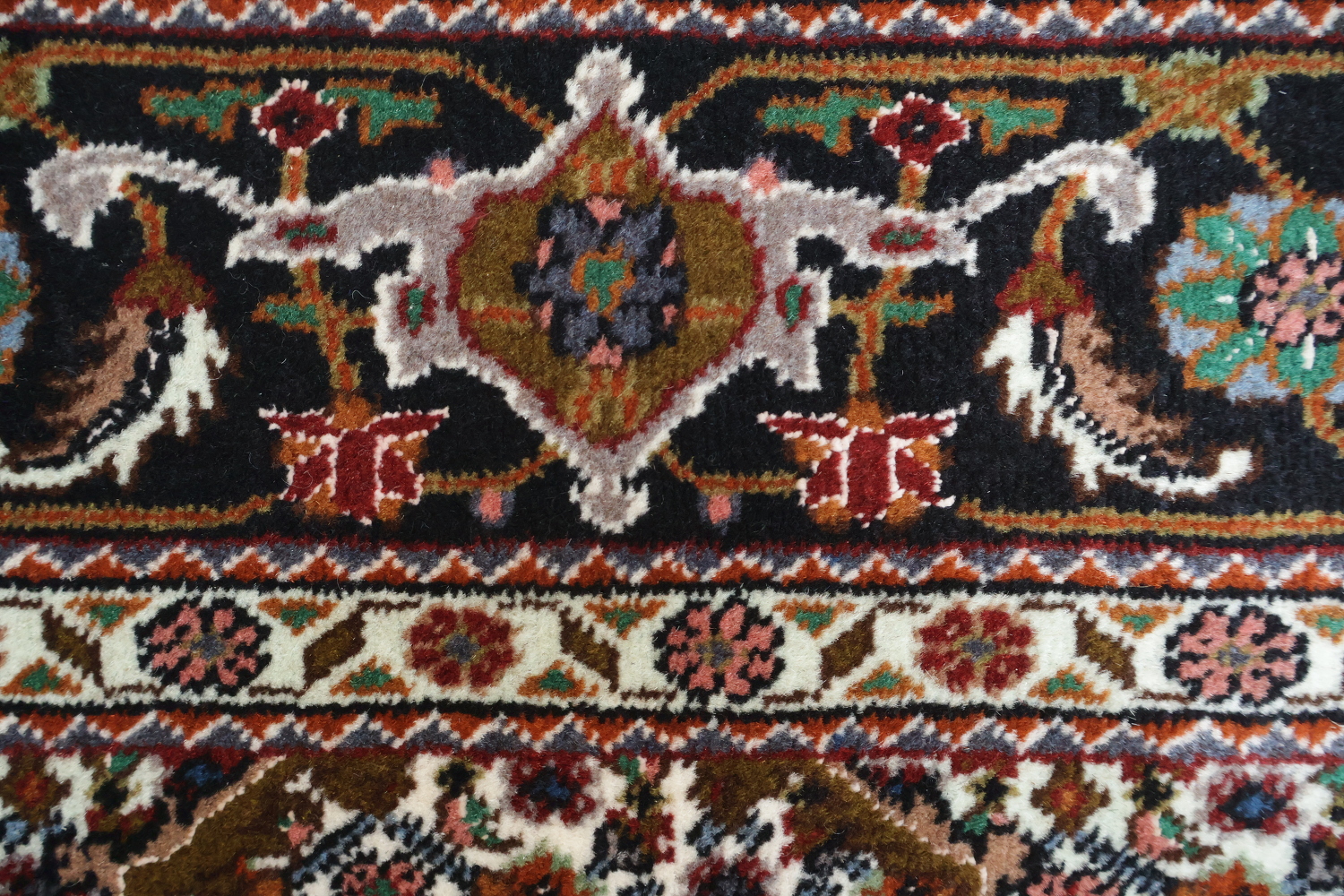 Wool and Silk Persian Tabriz Mahi design Area rug with an ivory field and Black Border 5x7