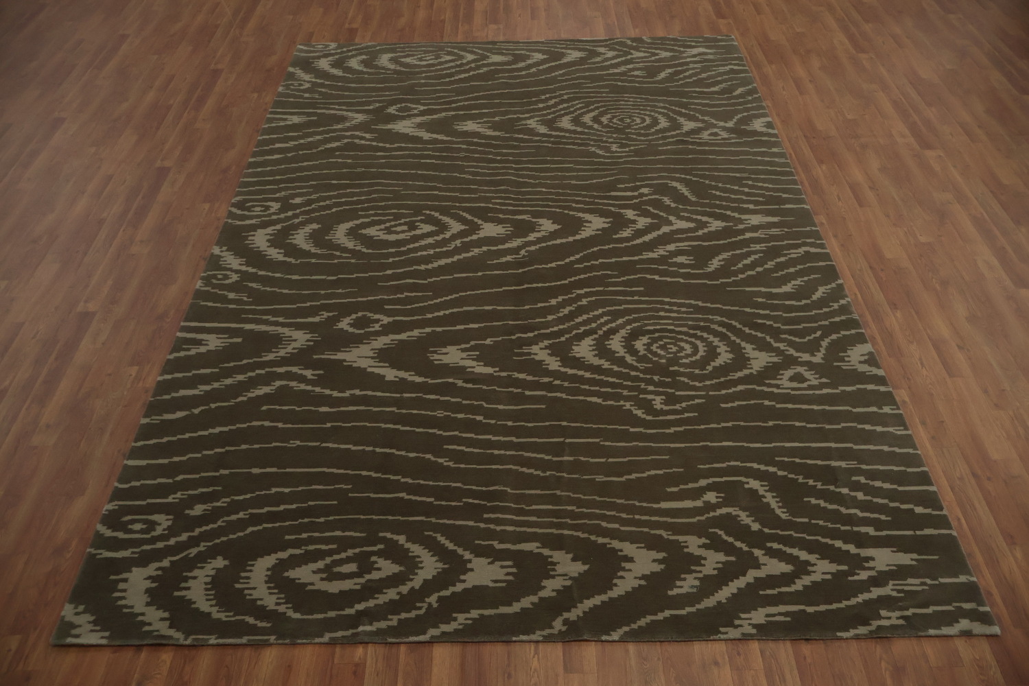 Modern Serenity: Neutral Tones Rug with Hypnotic Design 8x12
