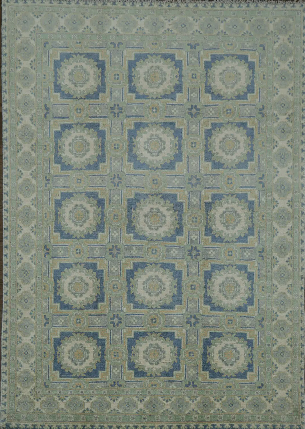 Muted beige, blue, and green tone Khotan Geometric Area Rug 5x7
