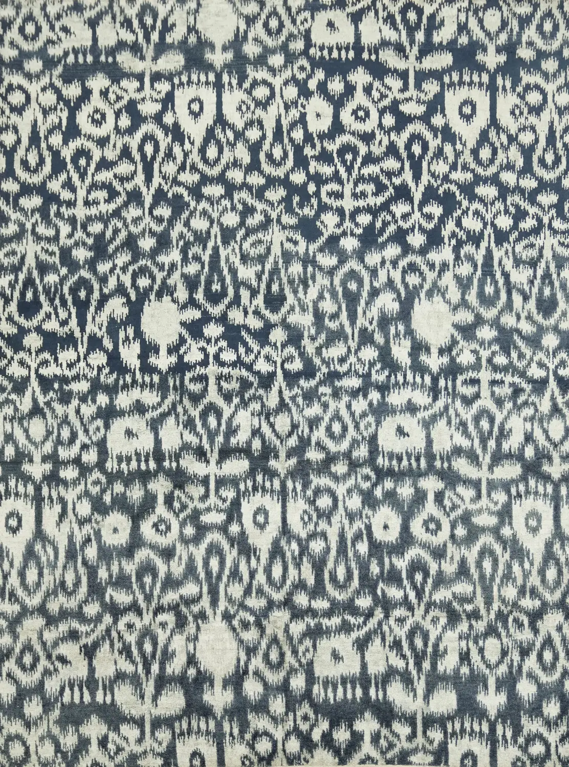 Elegant Navy and Ivory Ikat Patterned Rug for Living Spaces