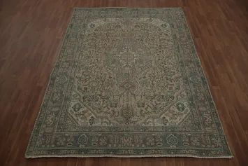 Antique Style Rug Featuring Traditional Motifs and Warm Hues 6x9
