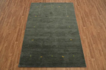 Elegant Olive Green Gabbeh Rug with Subtle Pattern Accents 5x8