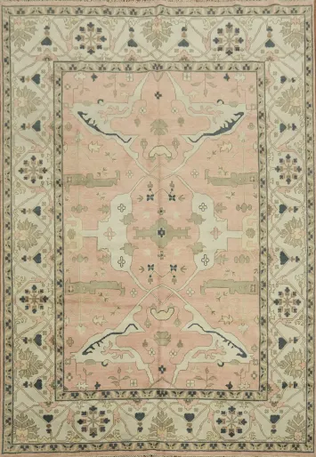 Elegant Vintage-Inspired Pink Rug with Subtle Floral Patterns 10x14