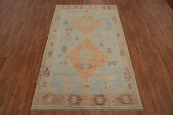 Soft Tones and Geometric Patterns in a Vintage-Style Rug 5x8