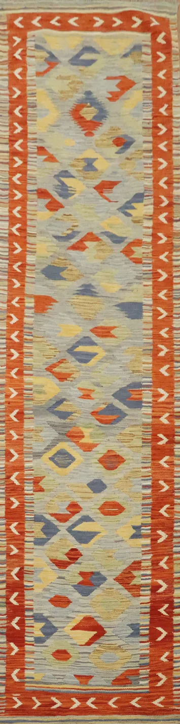 Handwoven Runner Rug Featuring Bright Tribal Patterns and Warm Hues 2'x10'
