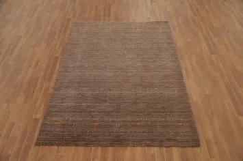 Minimalist Earth-Toned Rug with Delicate Colorful Details 5x7