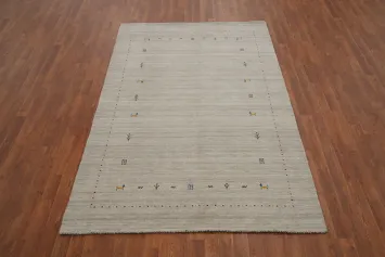 Luxurious Soft-Toned Gabbeh Area Rug 5x8 with Minimalist Artistic Flair