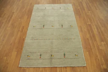 Elegant Gabbeh Rug 4x6 with Subtle Tribal Patterns