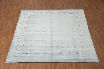 Soft Sky Blue Gabbeh Area Rug 9x9 with Delicate Tribal Accents