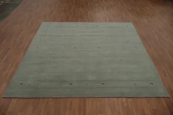 Elegantly Minimalist Gabbeh Area Rug 10x10 with Subtle Animal Accents