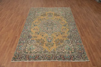 Graceful Tabriz Persian Area Rug 6x9 in Warm Earthy Tones