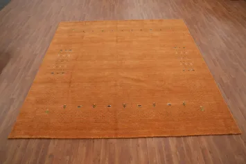 Warm Orange Gabbeh Area Rug 9x9 with Subtle Accent