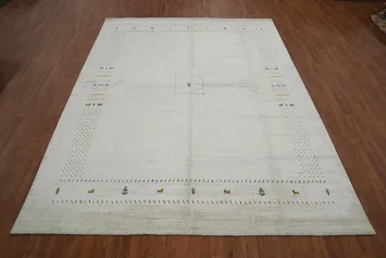 Versatile Gabbeh Area Rug 9x12 with Delicate Tribal Design and Border