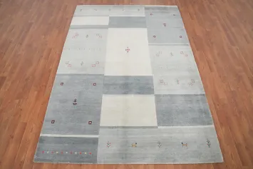 Elegant Gabbeh Area Rug 5x8 with Geometric Patterns and Soft Tones