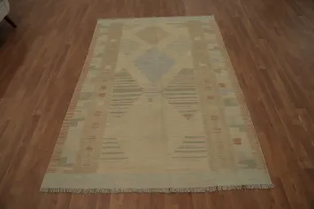 Muted Tones in Geometric Design: An Elegant Kilim Rug 5x7
