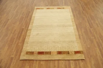 Handcrafted Gabbeh Area Rug 5x8 Featuring Warm Tones and Borders