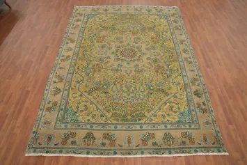Vintage-style Tabriz Persian Rug featuring detailed botanical patterns 8x11