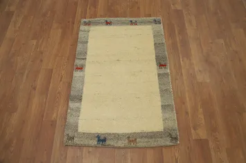 Rustic Elegance Gabbeh Rug 2x3 with Playful Animal Motifs