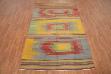 Vibrant Kilim Area Rug 5x9 with Multicolor Patterns and Dynamic Stripes