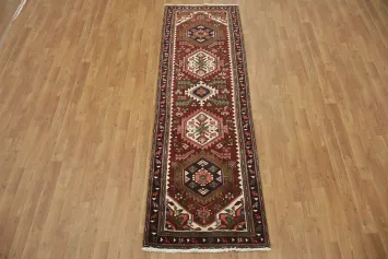 Timeless Red and Green Tribal Rug with Traditional Motifs