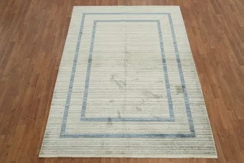Simple White Rug Accented with Subtle Blue Lines 5x8