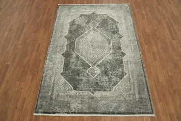 Vintage-inspired Distressed Rug with intricate geometric patterns in gray tones 5x8