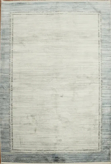 Minimalist Gray Rug with a Chic Blue Trim Design 5x8