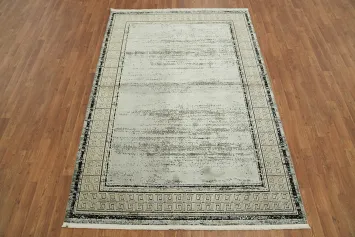 Neutral-Toned Green and Gray Area Rug with a Subtle Distressed Pattern 5x8