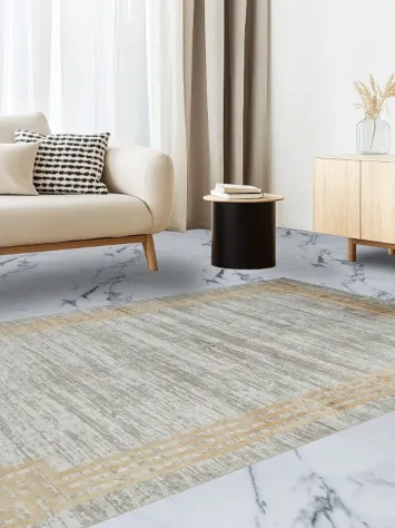 Chic Gray Rug with Modern Gold Frame for a Sleek Living Space 5x8