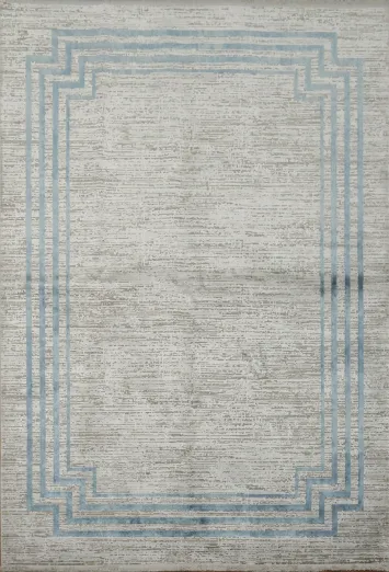 Versatile Grey Rug with Stylish Blue Framed Design 5x8