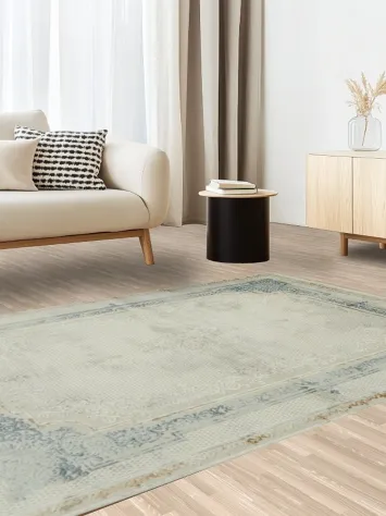 Antique-Style Soft Blue Rug with Delicate Border Details 5x8