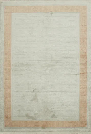 Elegant Neutral-Toned Rug with Soft Border Accent