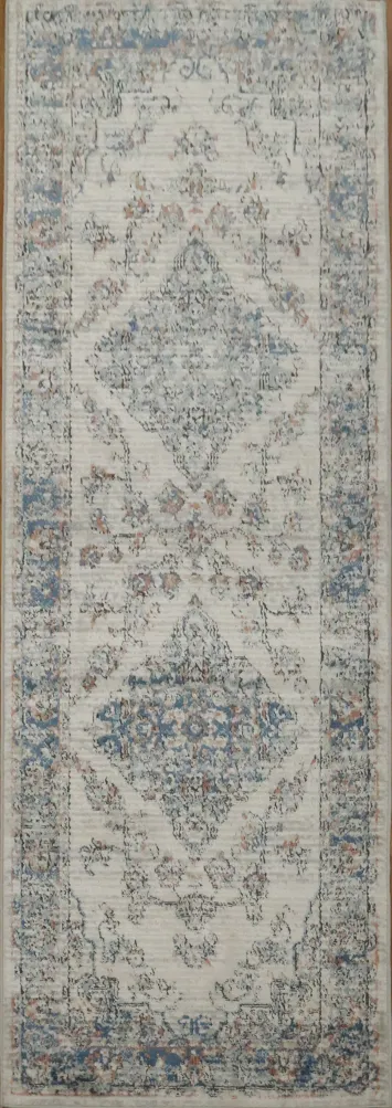 Classic woven rug featuring delicate vintage medallion accents 3x8
