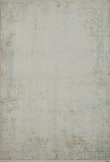 Chic Ambiance: Distressed Rug with Soft Blue Accents 5x8