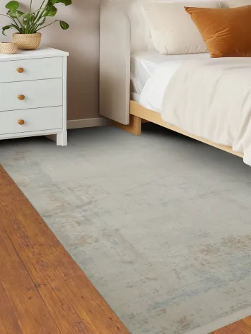 Chic Ambiance: Distressed Rug with Soft Blue Accents 5x8