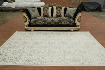 Luxurious Pale Blue Rug with Intricate Floral Vine Details 6x10