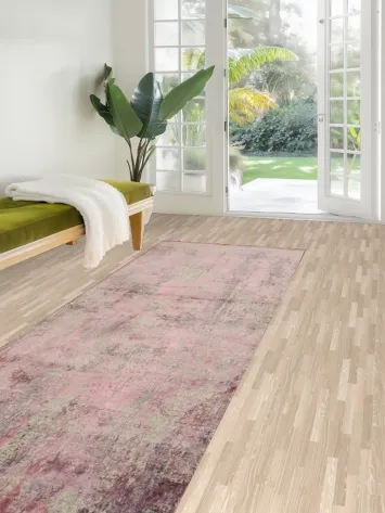 Elegant Vintage Pink Rug with Distressed Texture for Modern Spaces