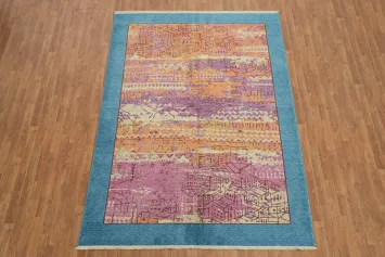 Vibrant Abstract Wool Rug with Geometric Patterns and Blue Border 6x9
