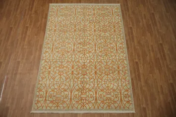 Vintage-inspired orange and beige patterned rug for elegant interiors 6x9