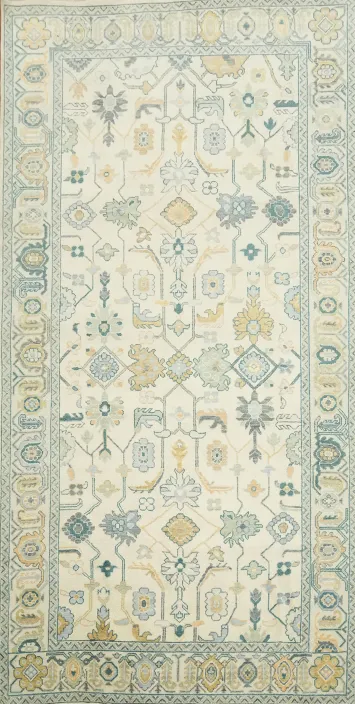 8'x16' Large Classic Ivory Rug with Intricate Pattern and Soft Blue Hues