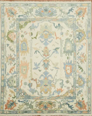 Classic Cream Rug Adorned with Subtle Blue and Green Patterns 8'x10'