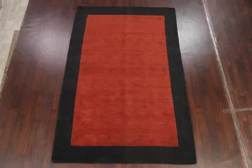 Luxury Handwoven Rust Red Rug with Black Border for Modern Living 7x10