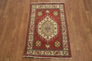 Vibrant Red Kazak Foyer Rug with Detailed Centerpiece and Border Patterns 2x3