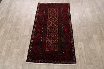 Traditional Handmade Rug Featuring Vibrant Red and Dark Motifs