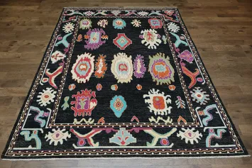 Bright and Whimsical Black Oushak Turkish Rug with Abstract Elements 8x11